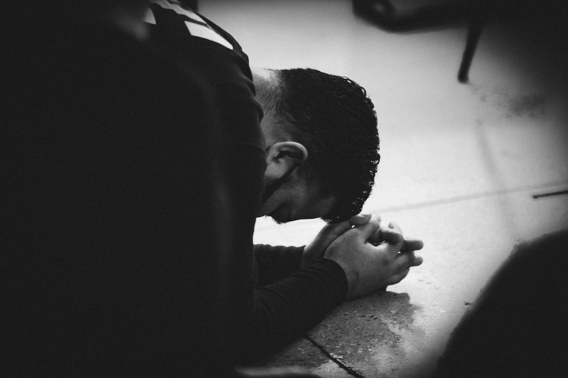 Pastor teaching from Scripture on stage